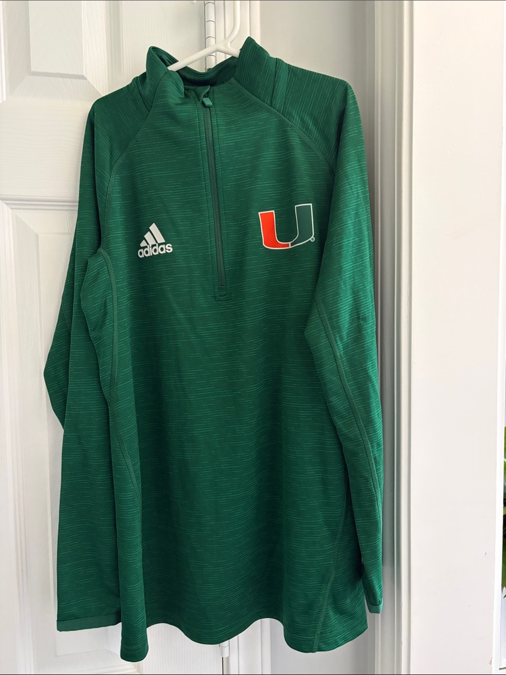 Adidas University of Miami Hurricanes Green Half-Zip Pullover with U M logo